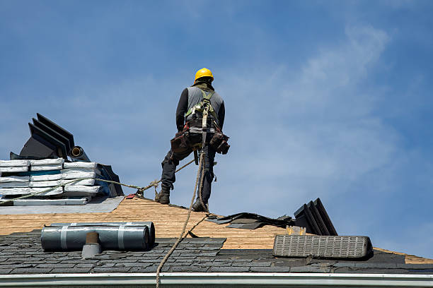 Professional Roof Replacement technician working in Huntsville, OH